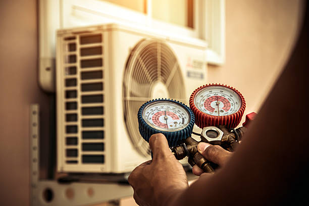 Professional Furnace Repair technician working in Auburn, MI